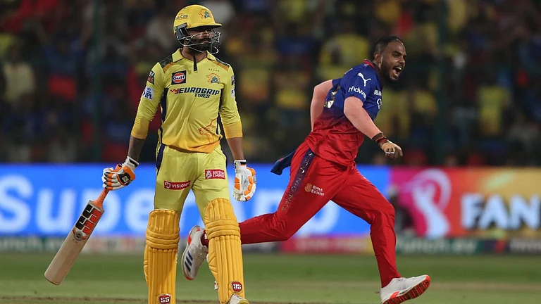 IPL 2024: Yash Dayal of RCB (right) celebrates after defeating CSK. - AP/Kashif Masood