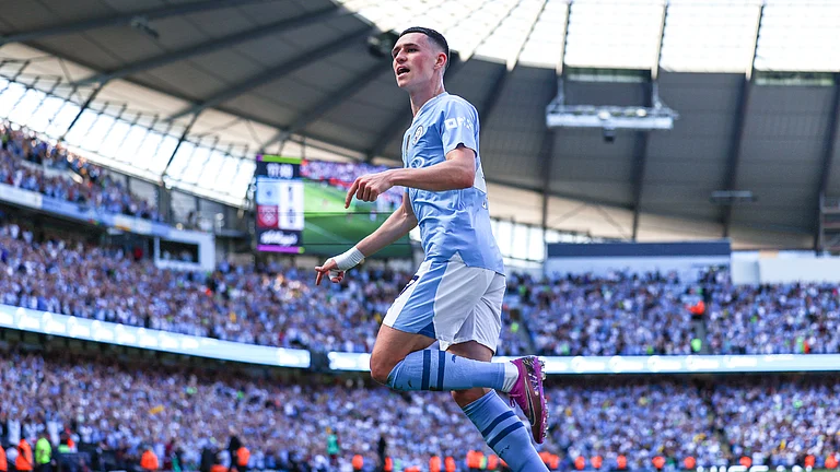 Phil Foden's two goals powered Manchester City to the Premier League title on Sunday - null
