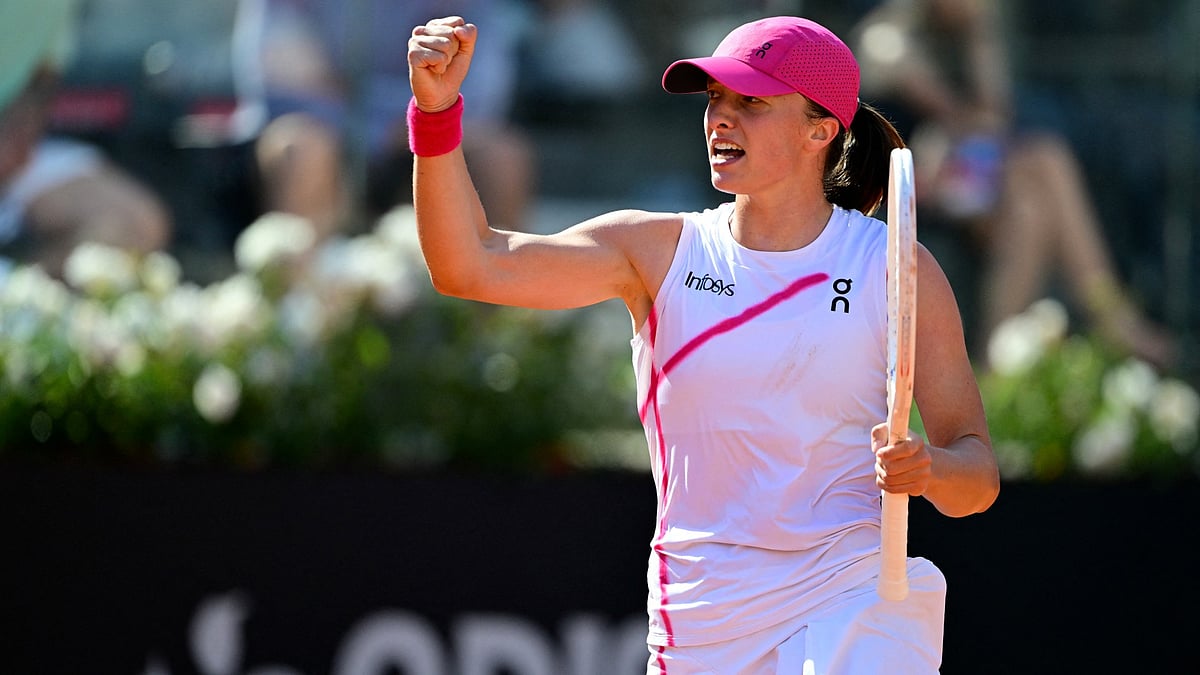 Iga Swiatek celebrates Monday's win over Angelique Kerber in the Italian Open round of 16 at Rome.