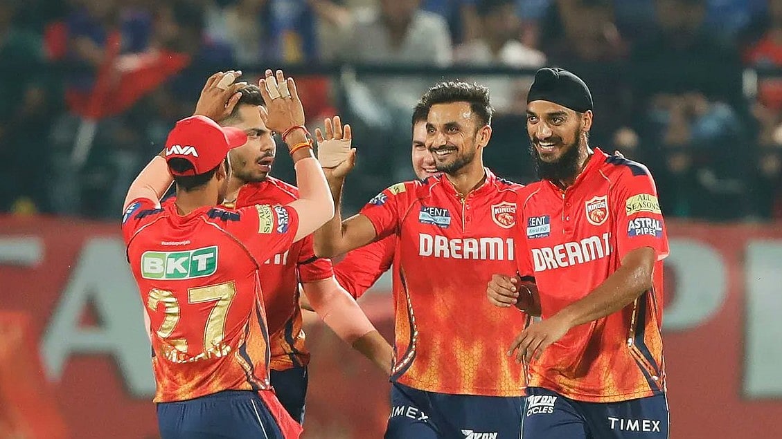Photo: X/ @CricCrazyJohns : Harshal Patel (centre) with Punjab Kings players celebrating after taking a wicket in IPL 2024.