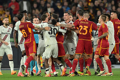 Players scuffle during the Europa League semifinal