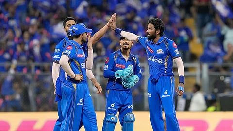 Mumbai Indians celebrate their win over SunRisers Hyderabad in match 55 of the 2024 IPL. 