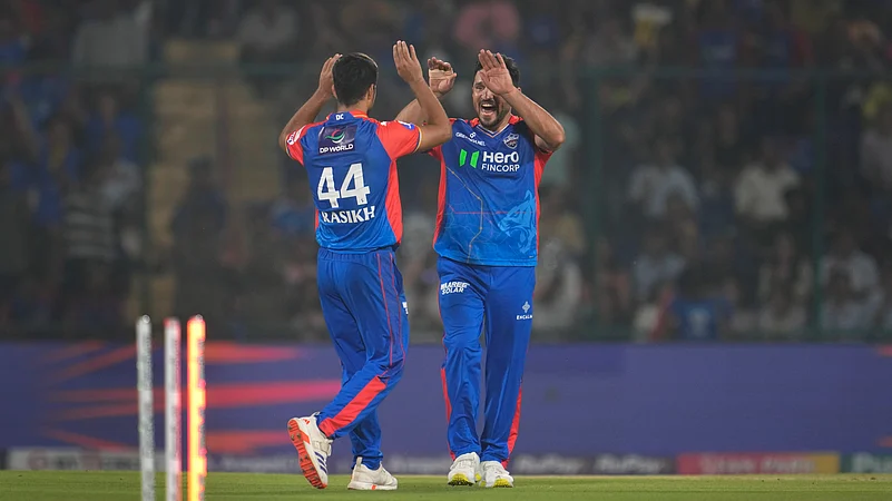 DC teammates celebrating a wicket in IPL 2024. AP Photo