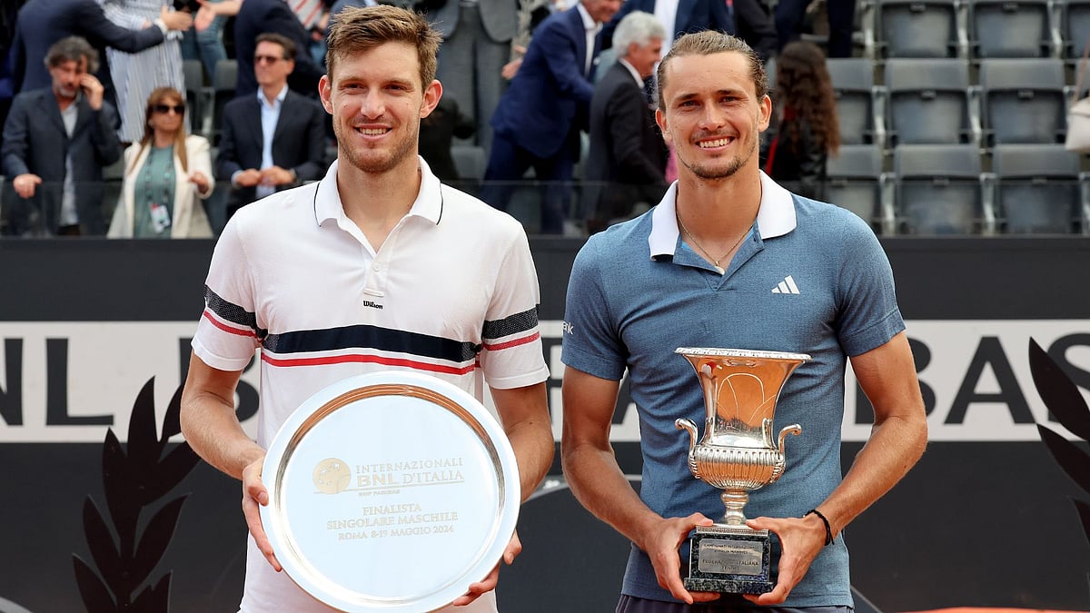 Zverev (right) saw off Jarry in straight sets. - null