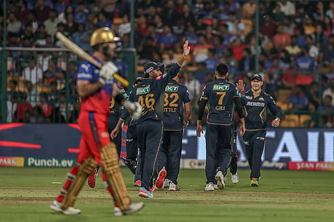 Gujarat Titans players celebrate Maxwell's wicket