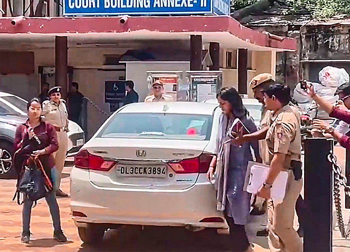 AAP MP Swati Maliwal arriving at the Tis Hazari court in Delhi. - PTI