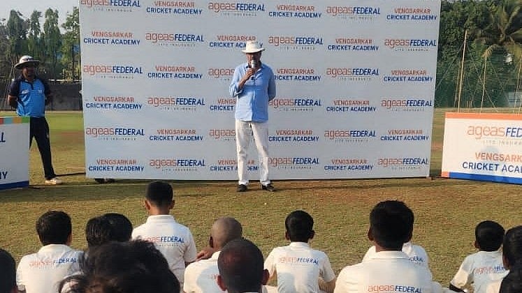 Photo: X/ @imvengsarkar : Former India captain Dilip Vengsarkar addressing the young trainees at the Ageas Federal Vengsarkar Cricket Academy at Mahul Chembur.