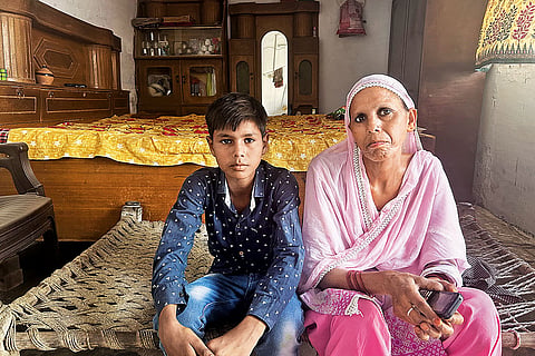 Zeenat Jahan, along with her son. Her husband has migrated for work