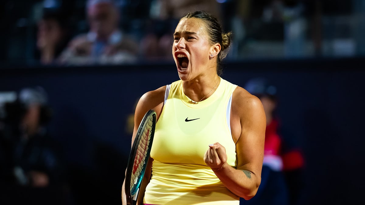 Aryna Sabalenka exults after her victory in the Italian Open quarter-finals.