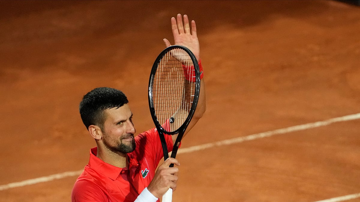 AP Photo/Alessandra Tarantino : Serbia's Novak Djokovic celebrates after winning a match against France's Corentin Moutet at the Italian Open tennis tournament in Rome.