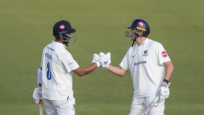 Cheteshwar Puajara (first from left) with James Coles in action during the Sussex vs Derbyshire County Championship 2024 match on May 4, Saturday.  - X | Sussex Cricket