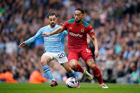 Wolve's Matheus Cunha and City's City's Bernardo Silva 