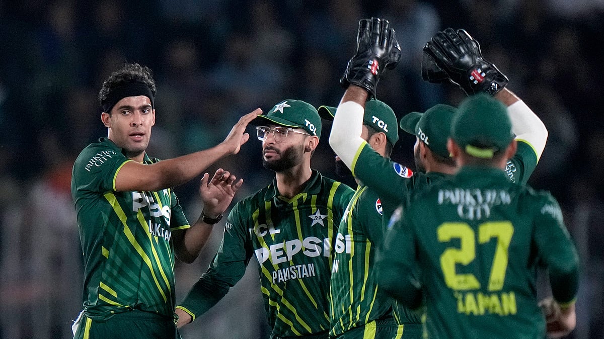 Pakistan's Abbas Afridi, left, celebrates with teammates after taking the wicket of New Zealand's Tim Seifert during their third T20 international cricket match in Rawalpindi on April 21, 2024. - Anjum Naveed/AP
