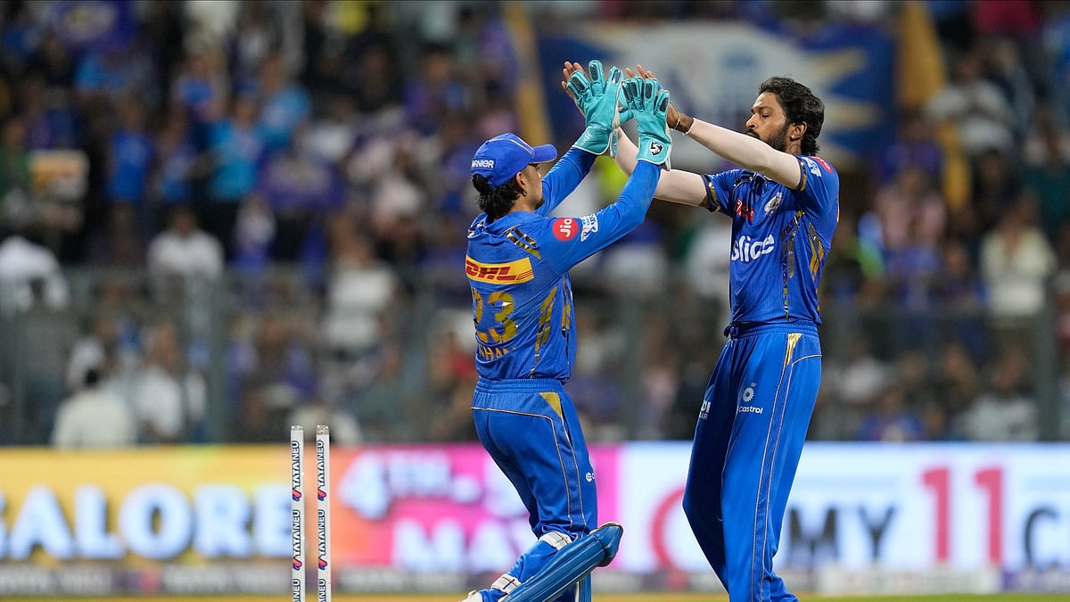 Hardik Pandya celebrating with Ishan Kishan in IPL 2024. AP Photo