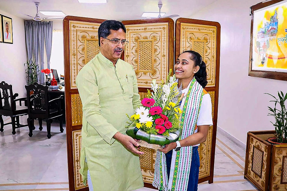 Manik Saha with Dipa Karmakar