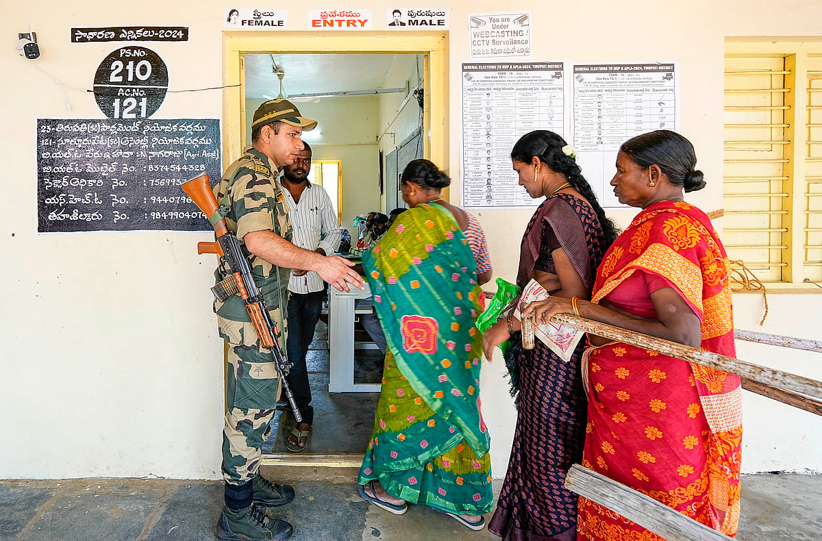 PTI : People arrive to cast their vote for the fourth phase of Lok Sabha elections and Andhra Pradesh Assembly election, in Tirupati, Monday, May 13, 2024. 