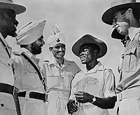 There’s More Than A Bit Of Africa In India (Photo by Archive Photos/Getty Images). : Lieutenant Daljit Singh Randhawa (1920 - 2016) MC (Military Cross) of the 6th Rajputana Rifles (2nd left), unidentified soldier, Sergeant Robinson Okeke of the 82nd (West Africa) Division and Captain AP Brown of the British Indian Army in discussion at the Rajputana Rifles Training Centre circa July 1944 at New Delhi, India.