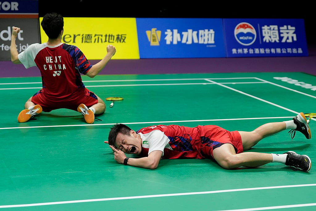 He Ji Ting, left and Ren Xiang Yu celebrate after defeating Muhammad Shohibul Fikri and Bagas Maulana to lead Team China to a 3-1 win over Team Indonesia in the final of the Thomas Cup held in Chengdu in southwestern China's Sichuan Province, Sunday, May 5, 2024.