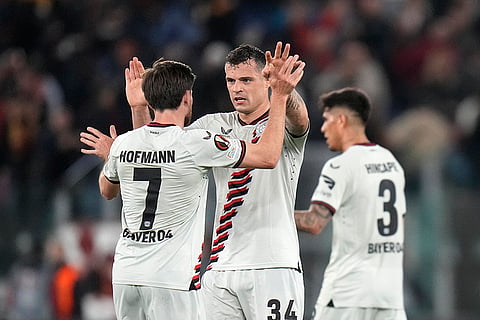 Leverkusen's players celebrate their victory