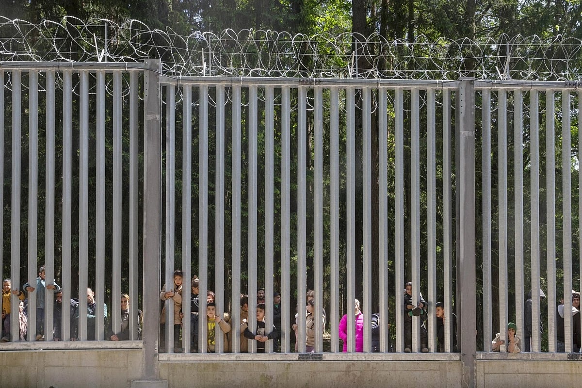 AP : The image shows wall between Poland and Belarus |