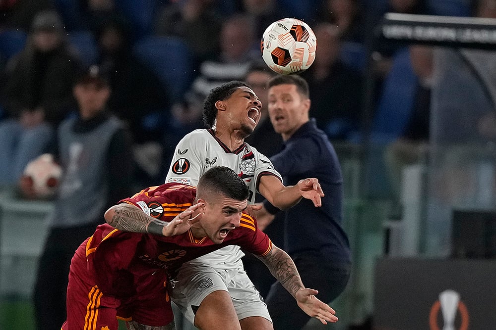 Romas Gianluca Mancini and Leverkusens Amine Adli 
