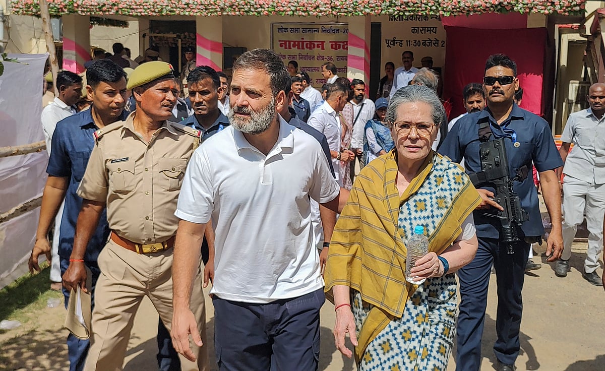 PTI : Congress leader Sonia Gandhi with son and party candidate from Rae Bareli Rahul Gandhi 