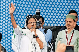Photo: Getty Images : Changing Colours: Mamata Banerjee at a festival