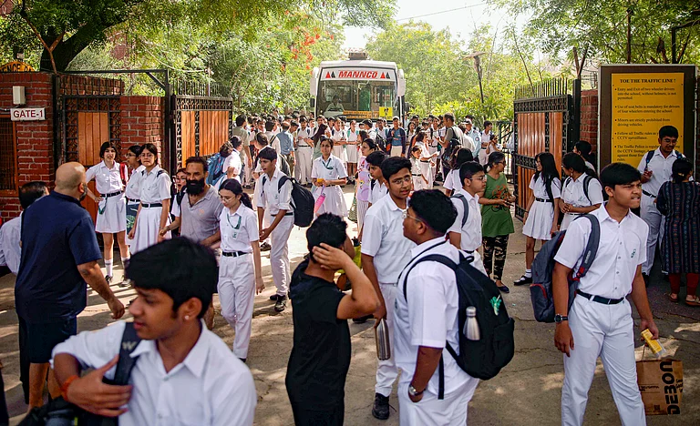 Students come out of the DPS School after a bomb threat was received by the school via e-mail, at Sector 30, in Noida, Wednesday, May 1, 2024. - PTI