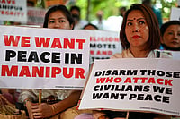 Getty Images : Members of the 'Chennai Manipuri community' hold a peace demonstration to protest in solidarity with the people of Manipur