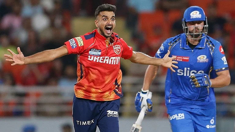 Harshal Patel of Punjab Kings claimed two wickets against Rajasthan Royals, taking his total tally to 22 wickets and dethroning Jasprit Bumrah to claim the top spot in IPL 2024. - Photo: AP/Surjeet Yadav