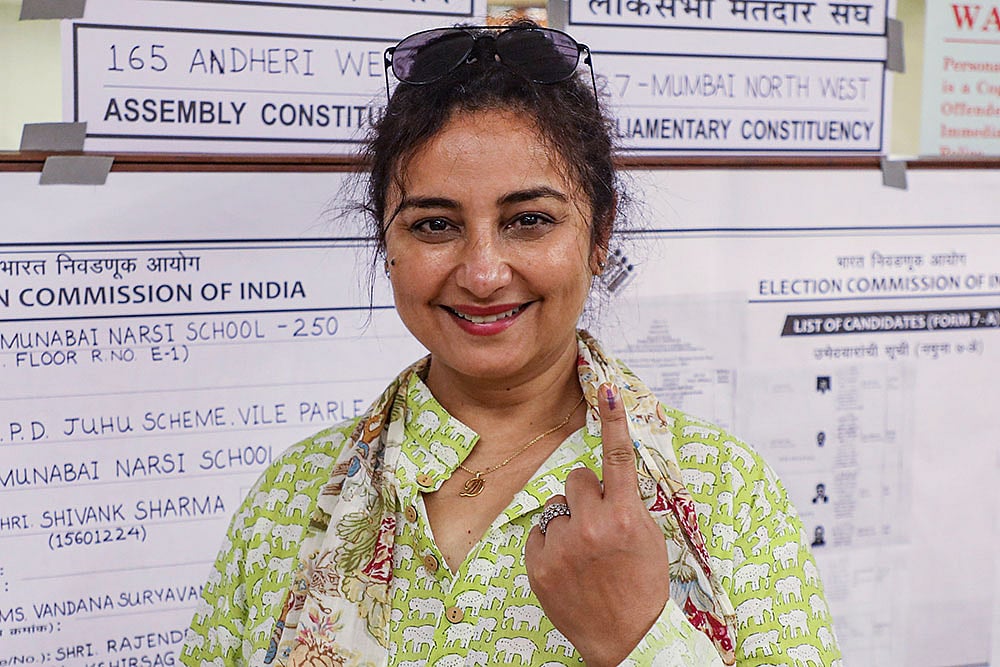 Actor Divya Dutta shows her inked finger