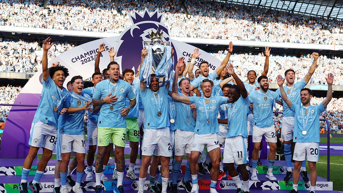 Manchester City players celebrate with the trophy after winning English Premier League 2023-24 for the fourth time in a row. - X/Premier League
