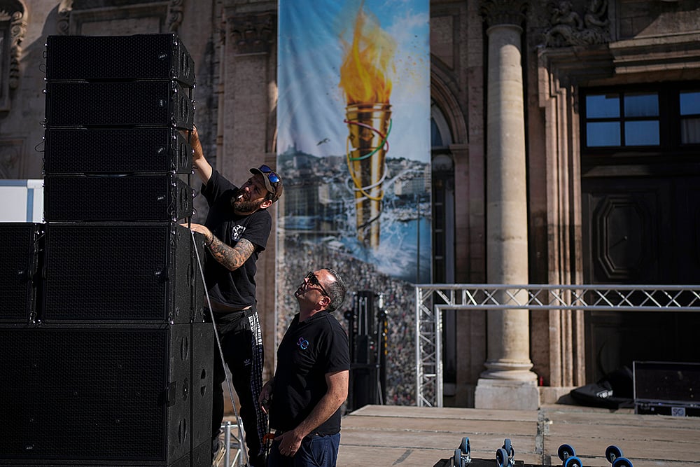 | Photo: AP/Daniel Cole : Preparation for Paris Olympics Flame arrival