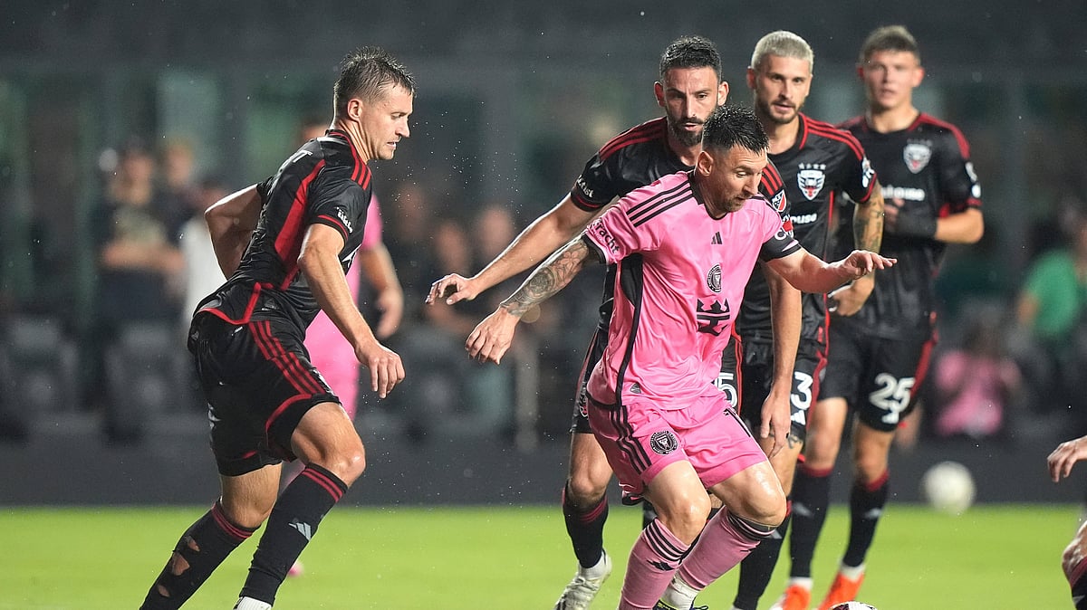 Inter Miami forward Lionel Messi, center, tries to control the ball during the first half of an MLS soccer match against D.C. United. - AP