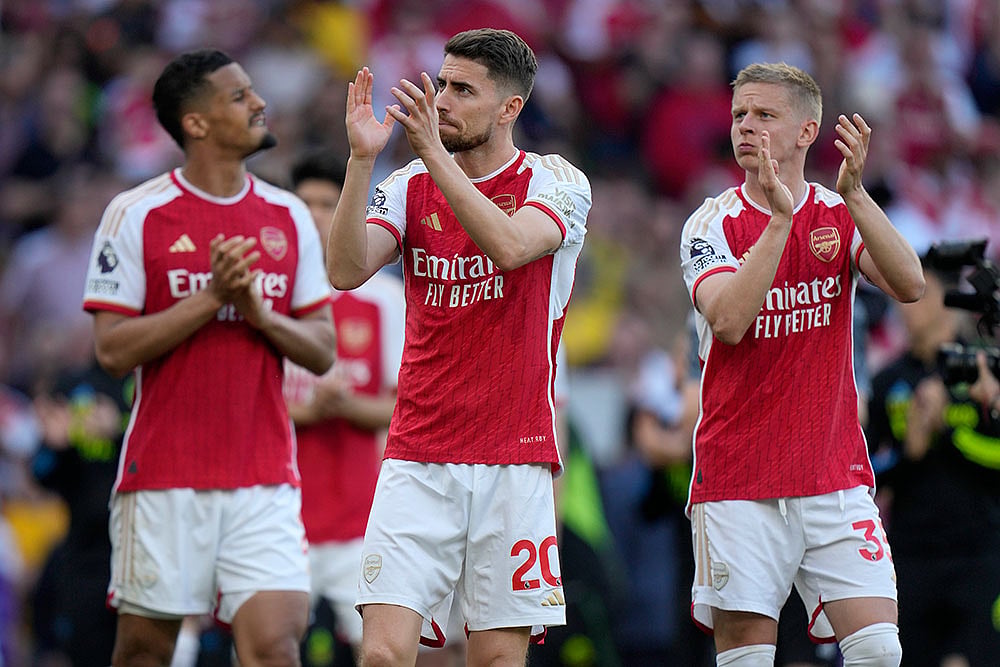 Photo: AP/Alastair Grant : Britain Soccer Premeir League
