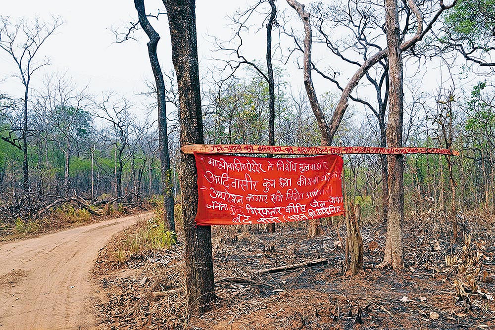 Photo: Dinesh Parab : At Polling Time: A banner of the CPI (Maoist) asking people to boycott the Lok Sabha elections hangs in a forest in south Gadchiroli
