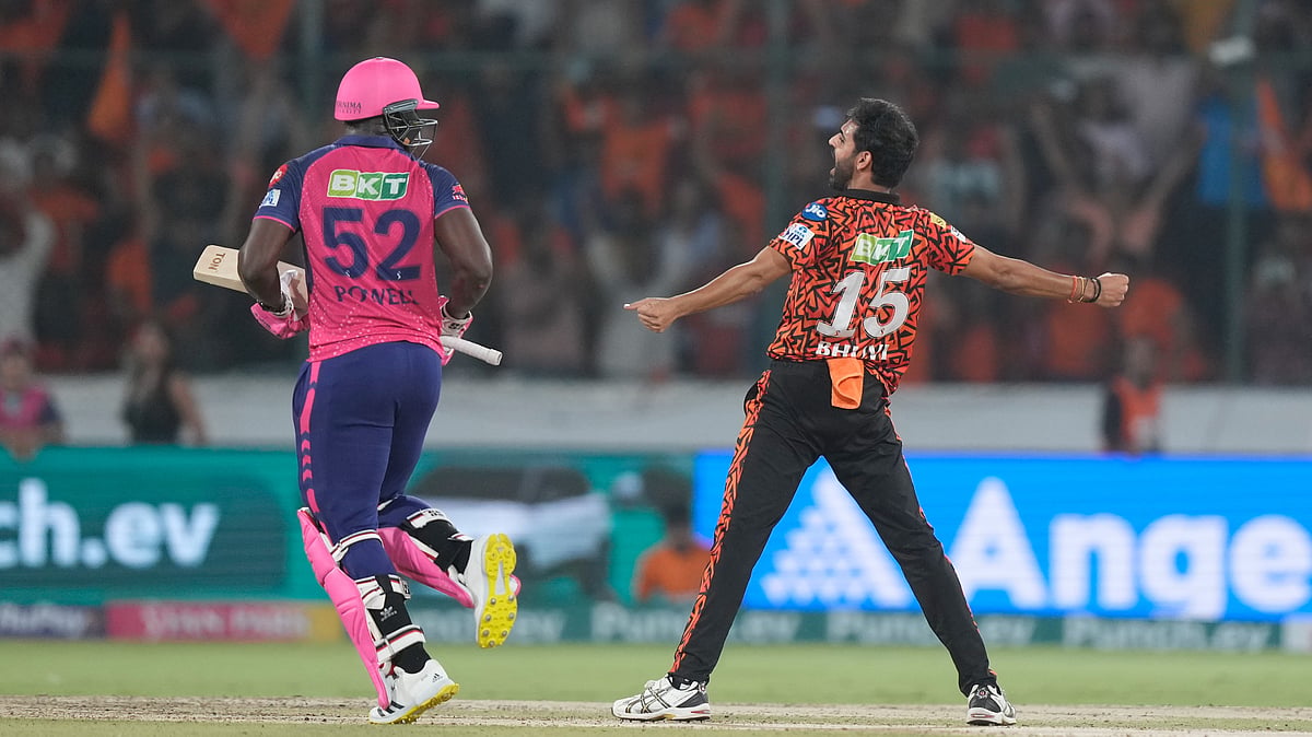 Sunrisers Hyderabad's Bhuvneshwar Kumar celebrates the wicket of Rajasthan Royals' Rovman Powell during the Indian Premier League cricket match between Sunrisers Hyderabad and Rajasthan Royals in Hyderabad. - AP Photo/Mahesh Kumar A.