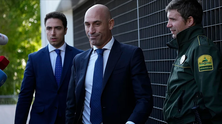Luis Rubiales will be facing trial for kissing Jenni Hermoso without her consent. - AP