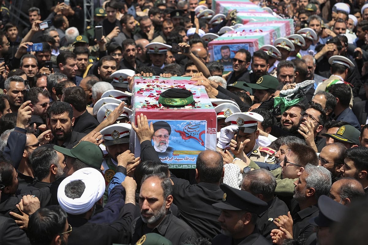 Iranian Presidency Office via AP : Flag Draped Coffins of Ebrahim Raisi and his entourage |
