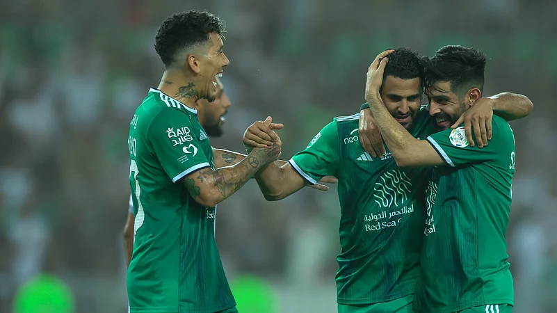 Roberto-Firmino-and-Riyad Mahrez-Al-Ahli