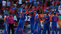 AP Photo/Ramon Espinosa : Indian players celebrate a dismissal during the ICC Men's T20 World Cup second semifinal cricket match between England and India at the Guyana National Stadium in Providence, Guyana.