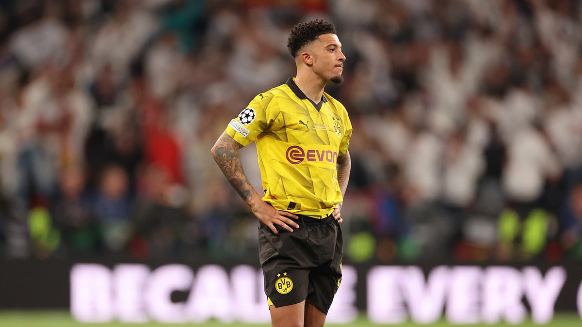 A defeated Jadon Sancho looks on at Wembley Stadium