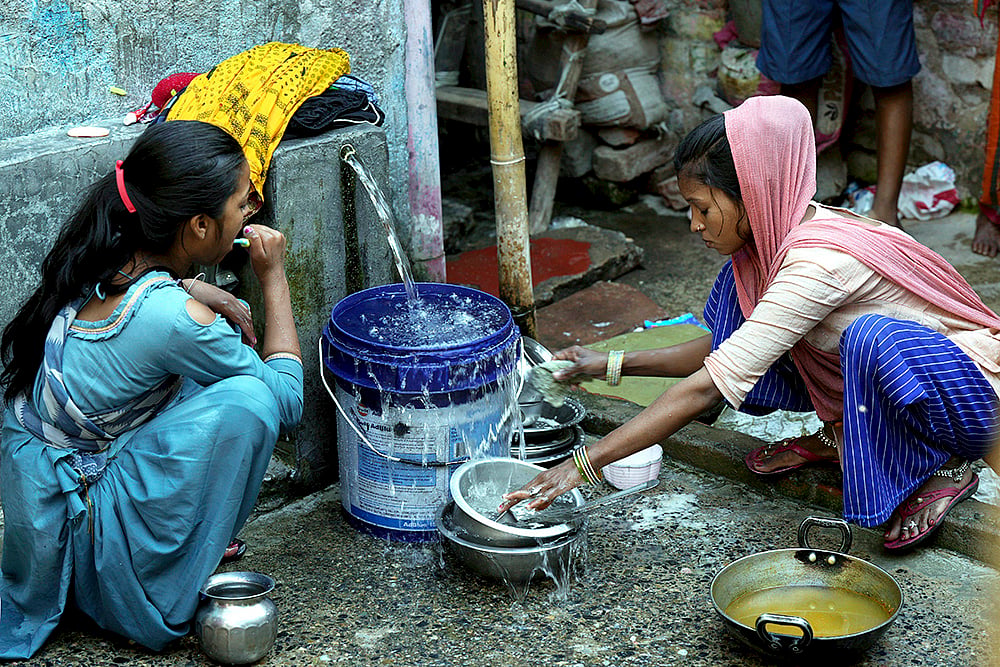 | Photo: PTI/Shahbaz Khan : Water crisis in Delhi