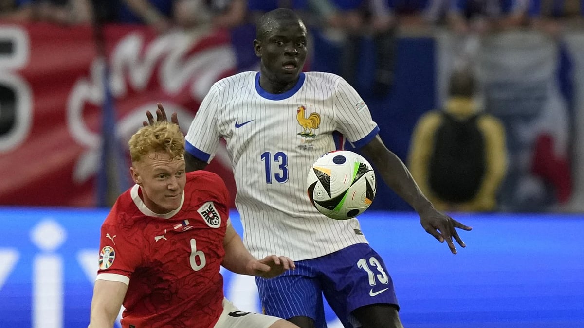 AP : N'golo Kante of France (right) in action against Austria at the Euro 2024.