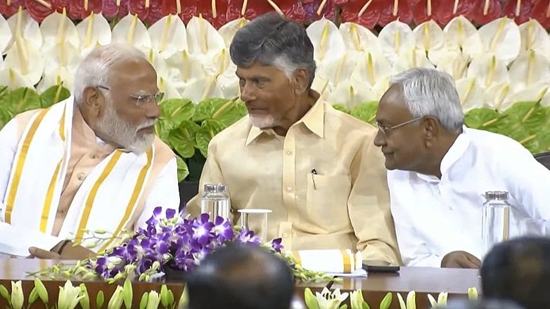 File/PTI : PM Modi (L) with key NDA partners Chandrababu Naidu (C) and Nitish Kumar (R) | 