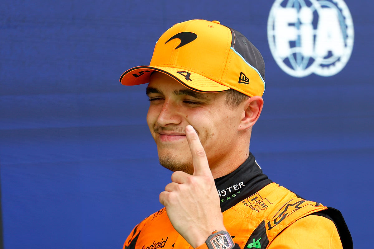 (AP Photo/Joan Monfort) : McLaren driver Lando Norris of Britain celebrates after winning the pole position for the Formula 1 Spanish Grand Prix at the Barcelona Catalunya racetrack in Montmelo, near Barcelona, Spain, Saturday, June 22, 2024. The race will be held on Sunday. 


