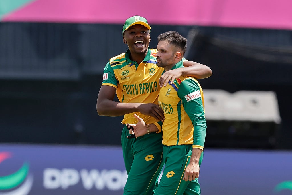 Adam Hunger/AP : Rabada and Maharaj