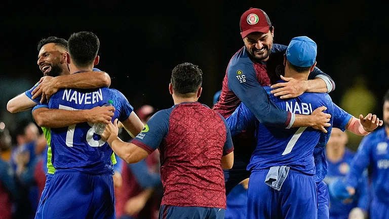 Afghanistan celebrate their win - Photo: AP/Ramon Espinosa