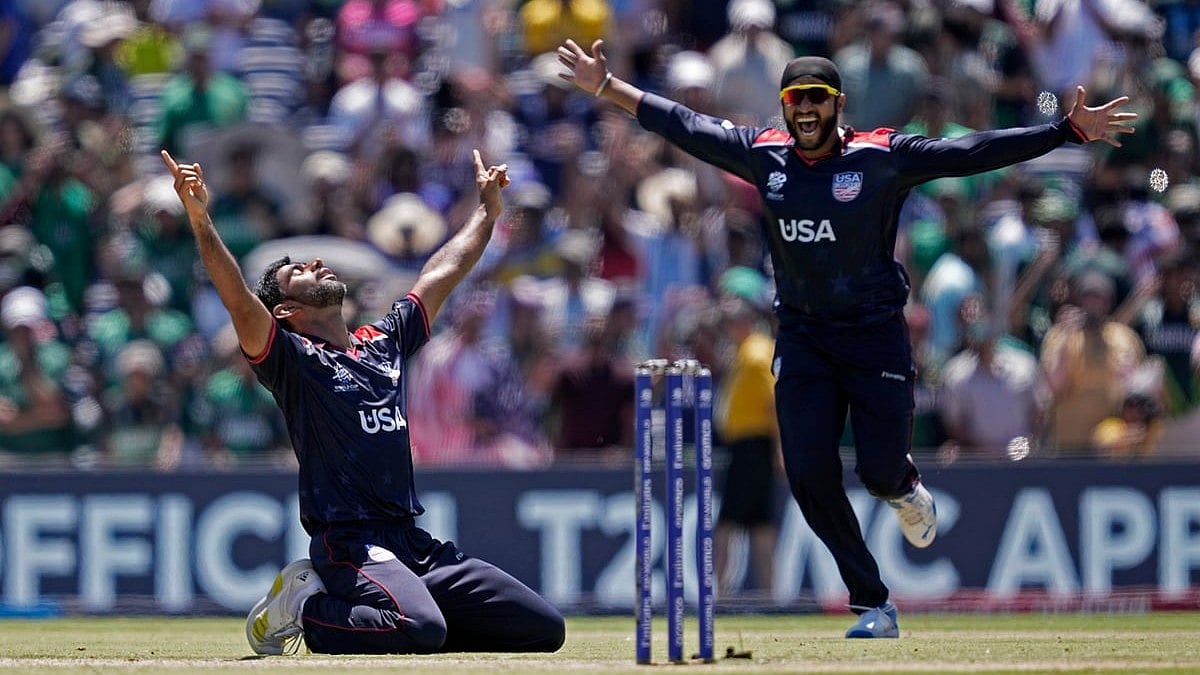 United States' Saurabh Netravalkar, left, celebrates after their win in the ICC Men's T20 World Cup cricket match against Pakistan at the Grand Prairie Stadium in Texas. - Photo: AP/PTI
