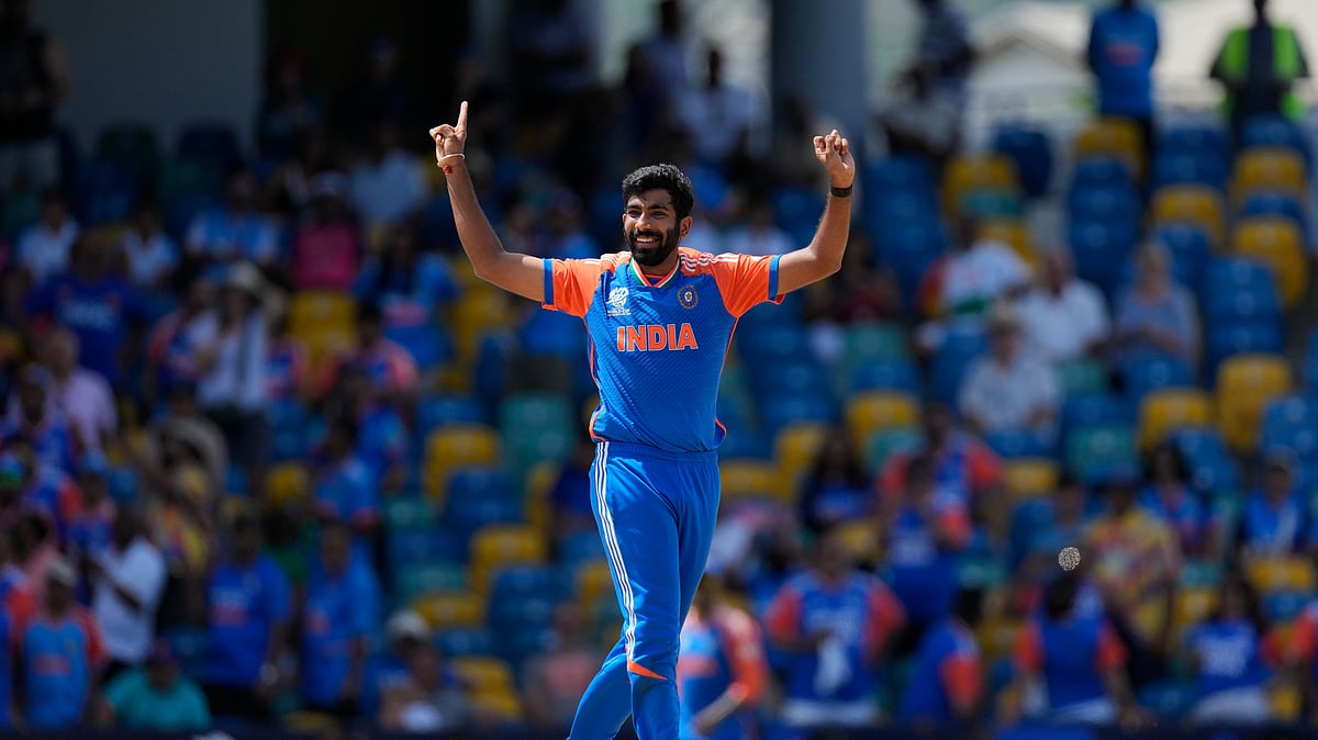 AP Photo/Ricardo Mazalan : India's Jasprit Bumrah celebrates the dismissal of Afghanistan's Najibullah Zadran during the ICC Men's T20 World Cup cricket match between Afghanistan and India at Kensington Oval in Bridgetown, Barbados.